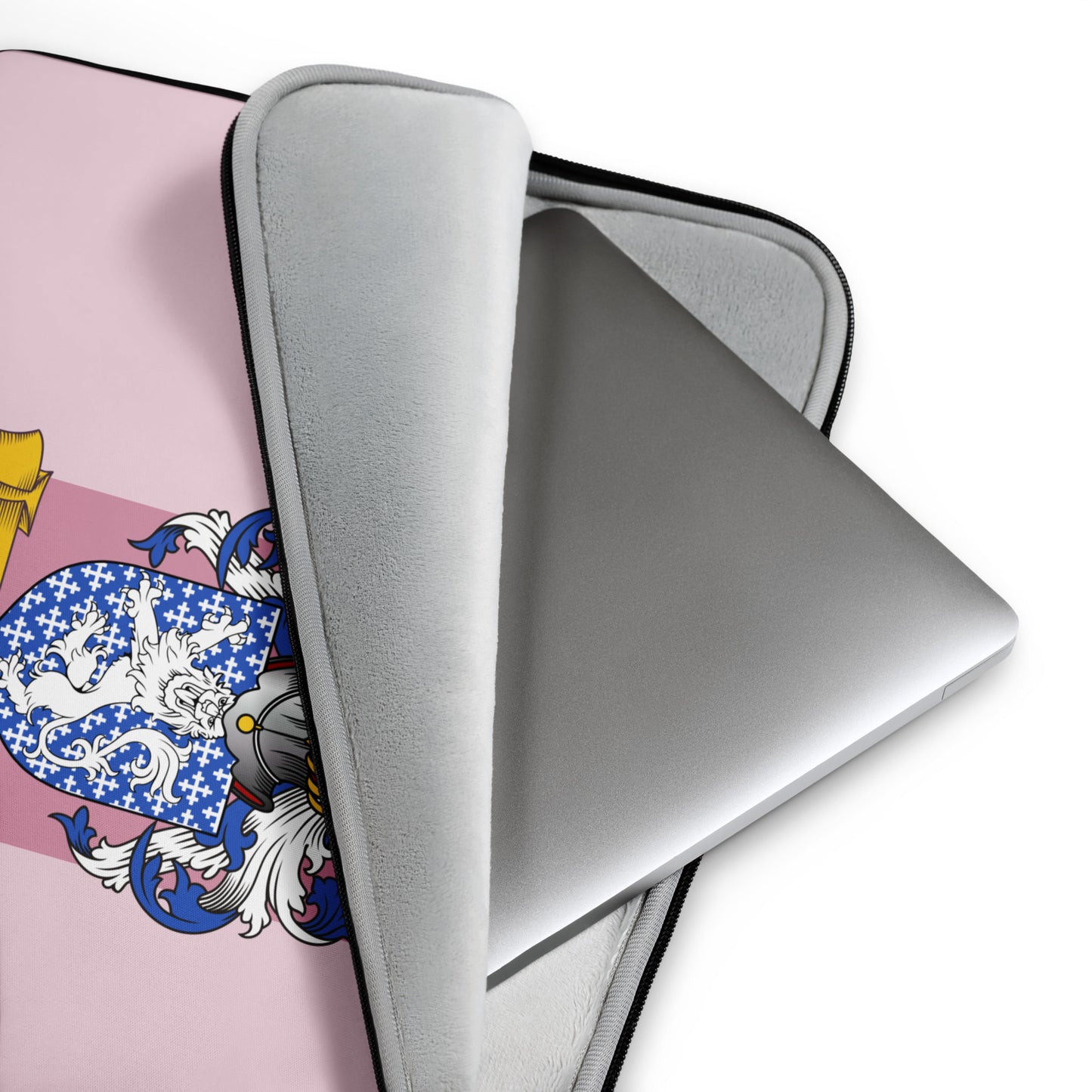 Laptop with a pink case featuring a Family crest design on a white background