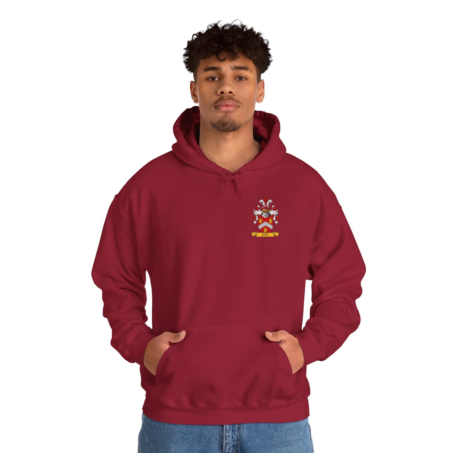 Young man  wearing a red hoodie with a personalized family crest on a white background