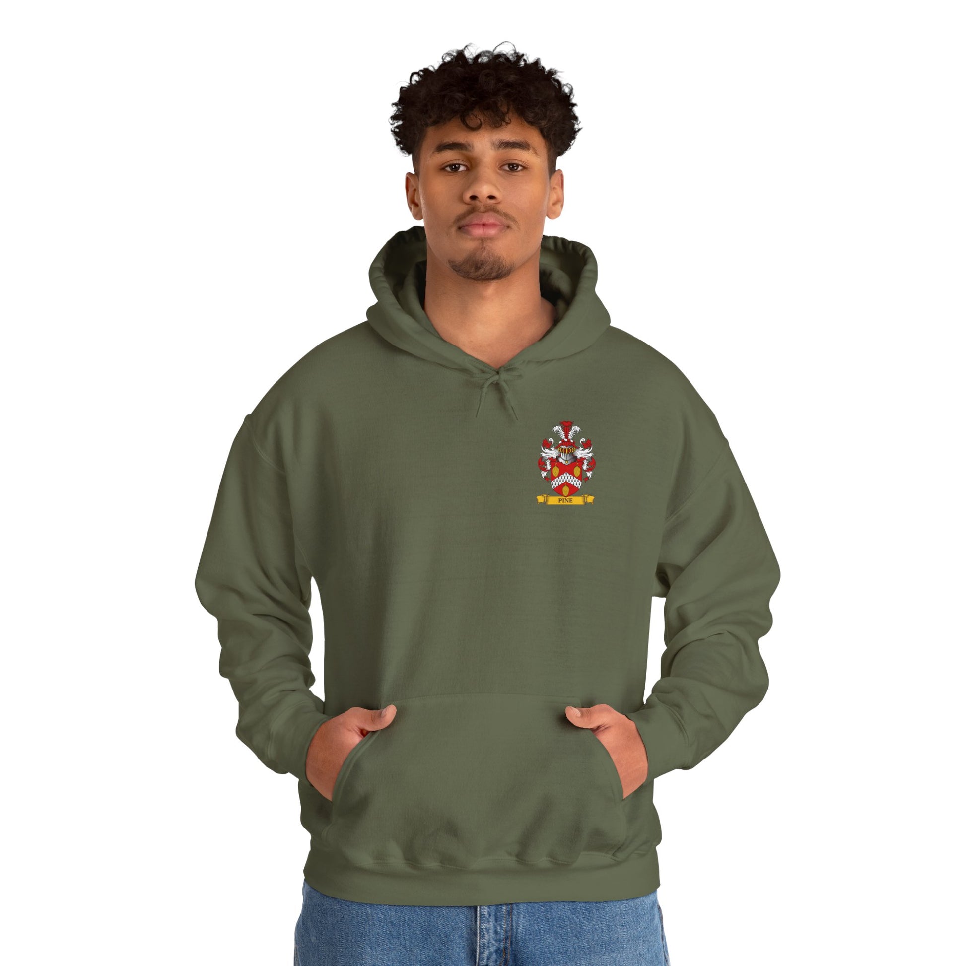 Person wearing a green hoodie with a personalized medieval family crest shield on a white background