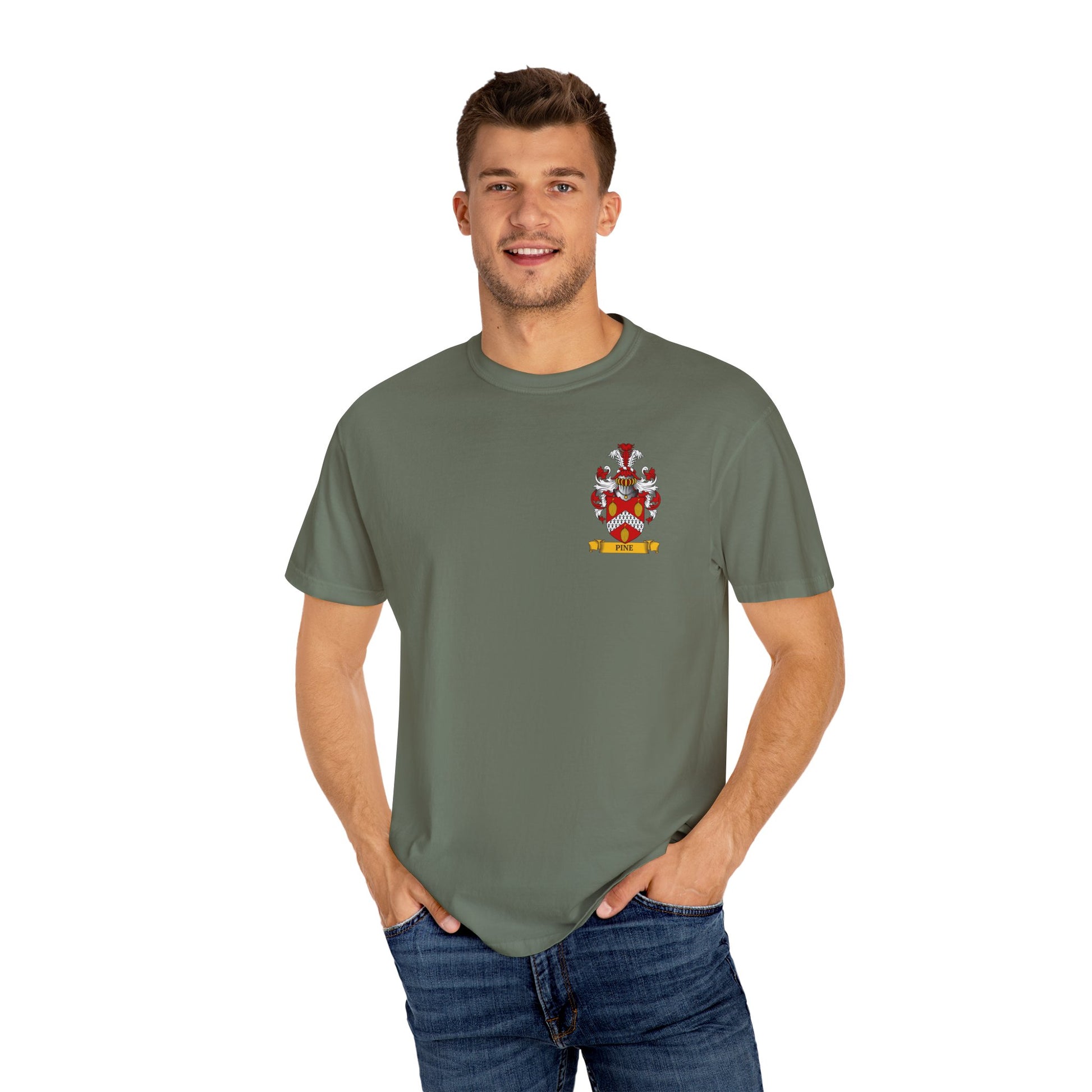 Man wearing a Garment-Dyed green t-shirt with his family crest on a white background