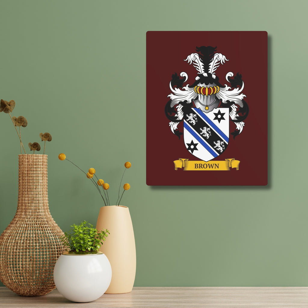 Personalized burgundy color metal print above decorative vases and plants.
