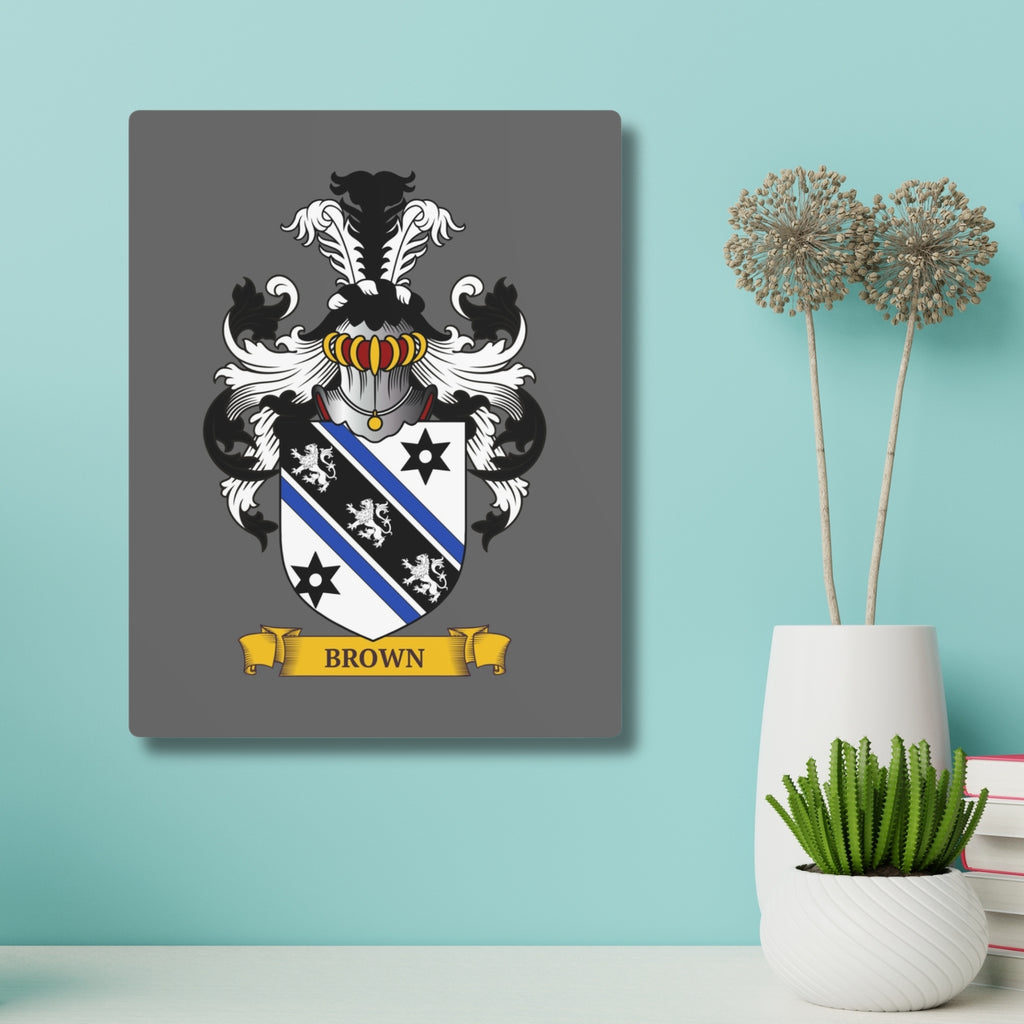 Personalized gray metal print with a Family crest, displayed on a wall with decorative elements.