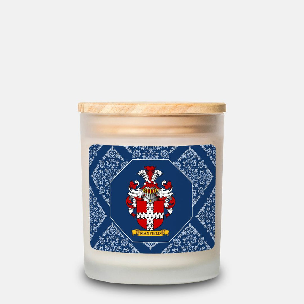 Personalized scented candle with a wooden lid featuring a coat of arms design on a blue and white patterned label.